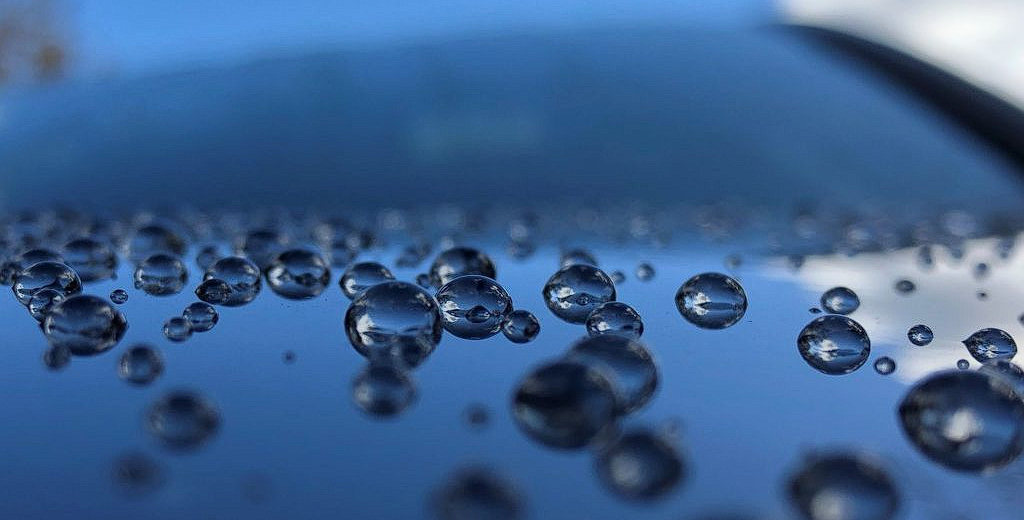 Water beading on a freshly ceramic coated car detailed by S&F Auto Detailing